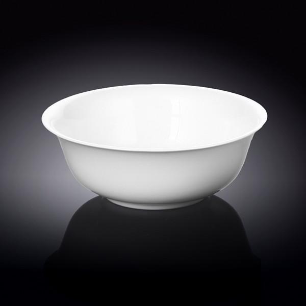 A classic 8-inch white porcelain bowl, perfect for serving soups, salads, and pasta, showcasing its elegant round design and rolled rim.