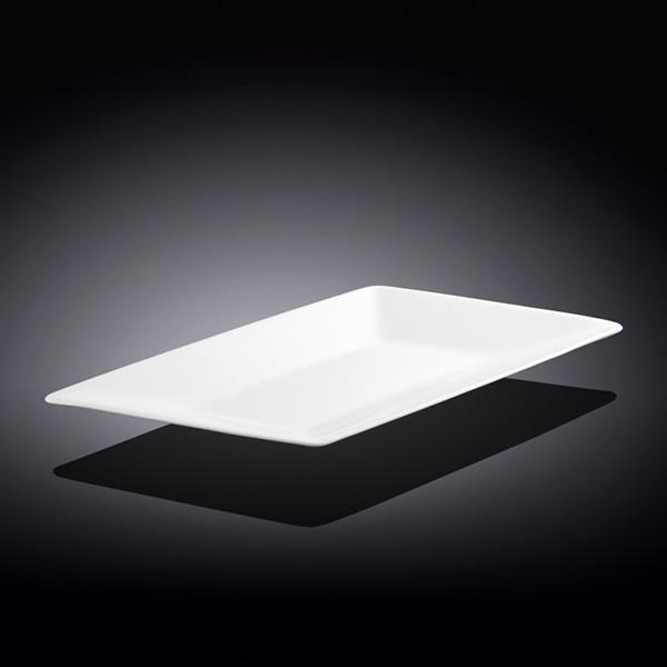 A 12-inch White Diamond Dish made of fine porcelain, featuring a unique diamond shape and rolled rim, perfect for elegant dining.