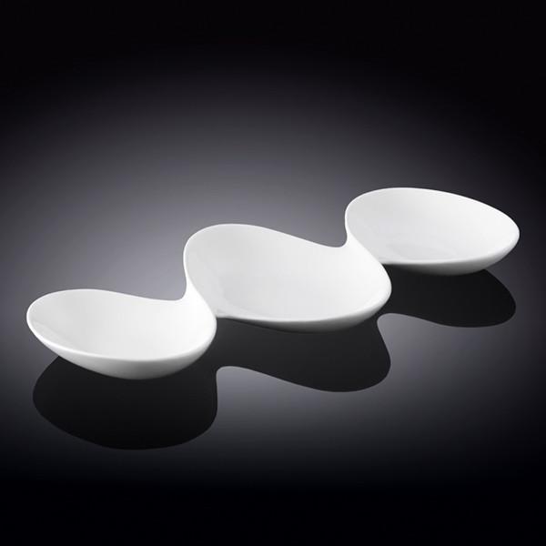 White divided sauce dish with three compartments, perfect for serving seafood and appetizers elegantly.