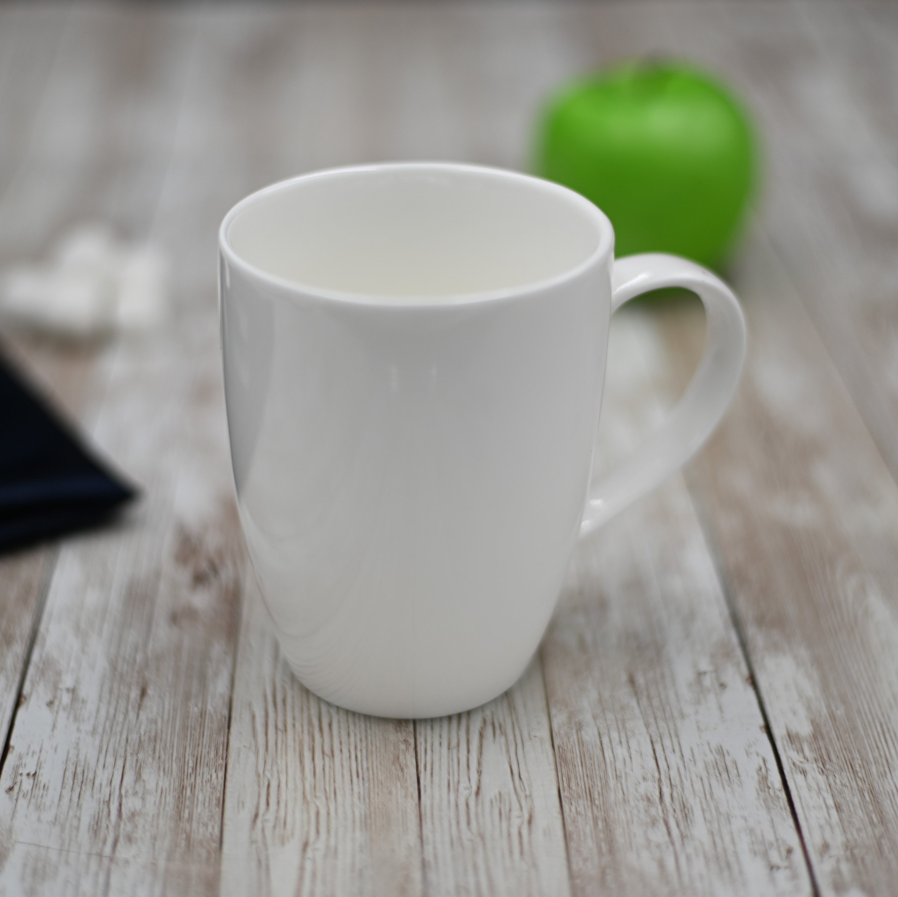 Elegant WILMAX White Mug, 16 oz porcelain, perfect for coffee and tea, stylish design, microwave and dishwasher safe.