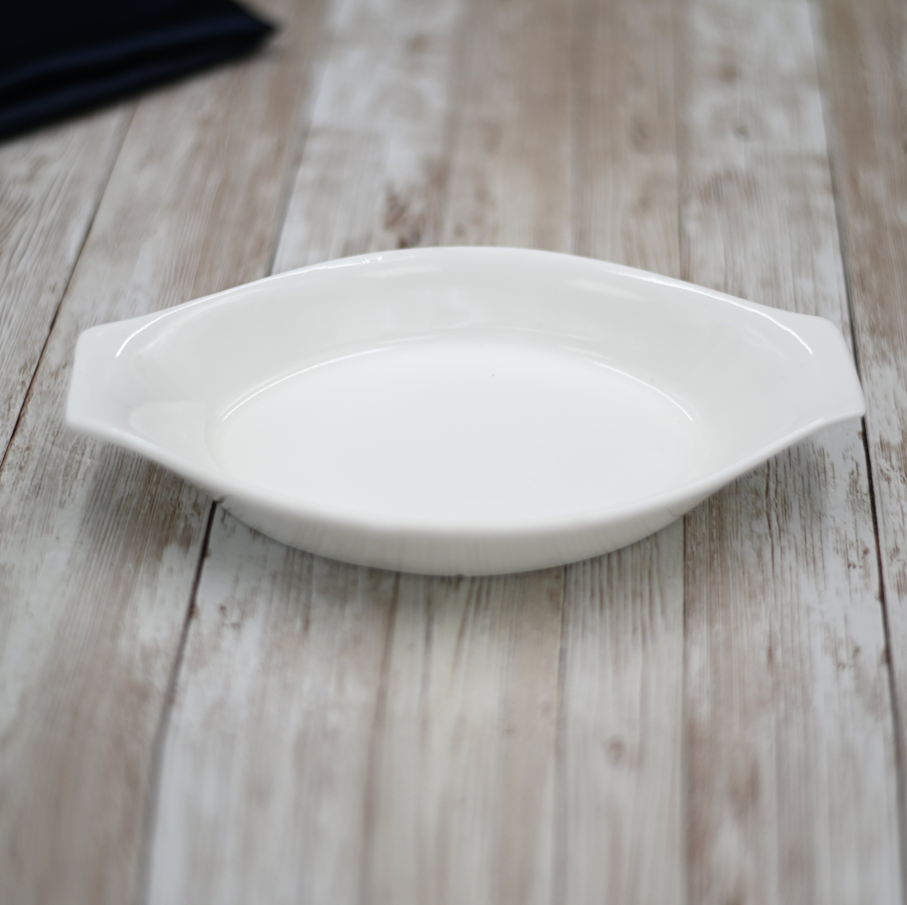 WILMAX White Oval Casserole Baking Dish, 8 inches, fine porcelain, elegant design for oven-to-table serving.