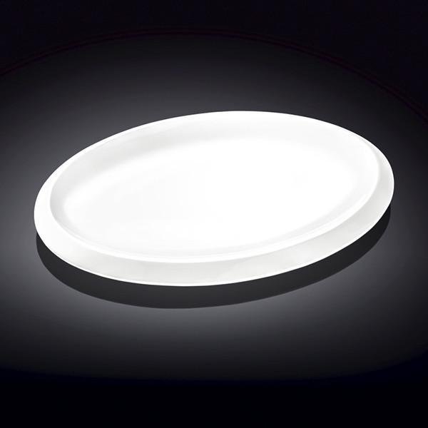 Elegant white oval platter measuring 14 inches, perfect for serving various dishes, made from high-quality porcelain.