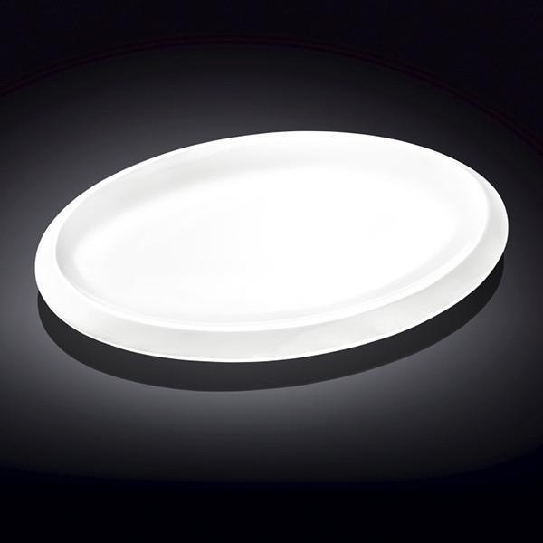 Elegant white oval platter measuring 16 inches, perfect for serving various dishes, made from high-quality porcelain.