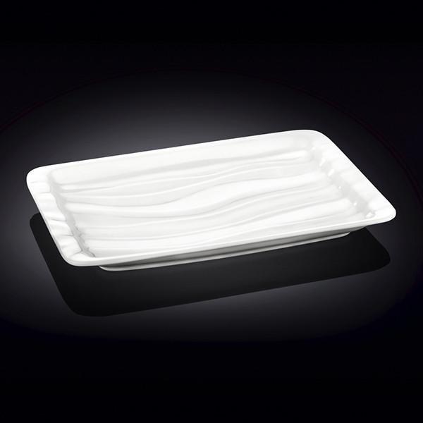 Elegant white rectangular Japanese style dish, perfect for serving sushi and other delicacies, showcasing a unique wave texture.