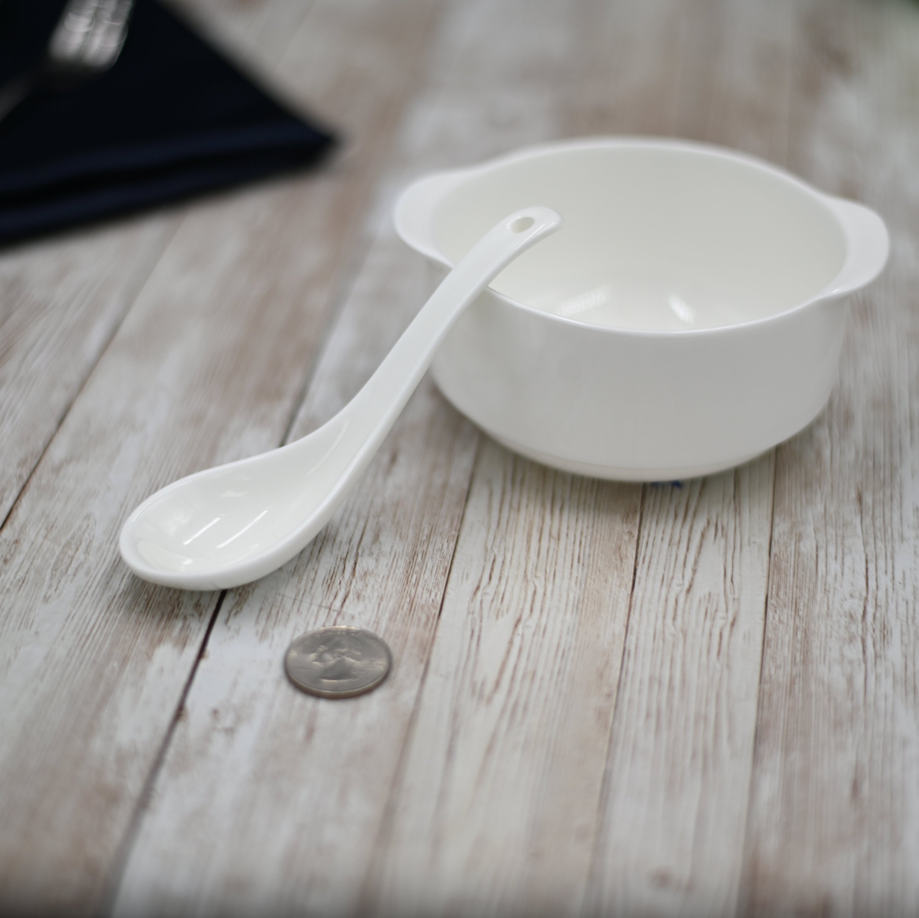 A set of elegant white porcelain soup cups, 4.25 inches in diameter, perfect for serving soups and stews.