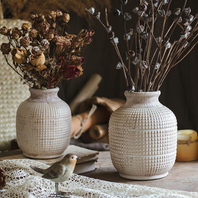 A beautifully handcrafted white textured porcelain ceramic jar vase, showcasing a unique design and elegant finish.