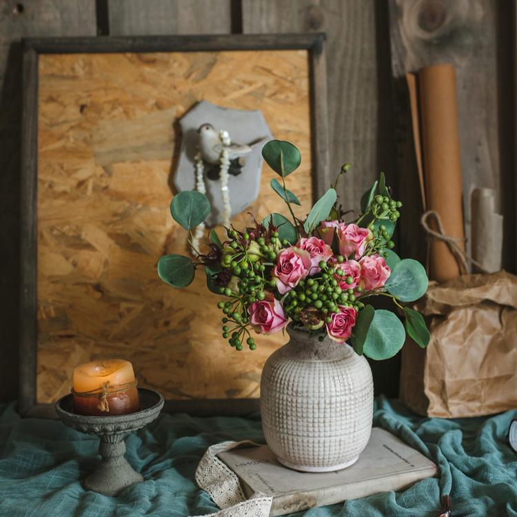 A beautifully handcrafted white textured porcelain ceramic jar vase, showcasing a unique design and elegant finish.