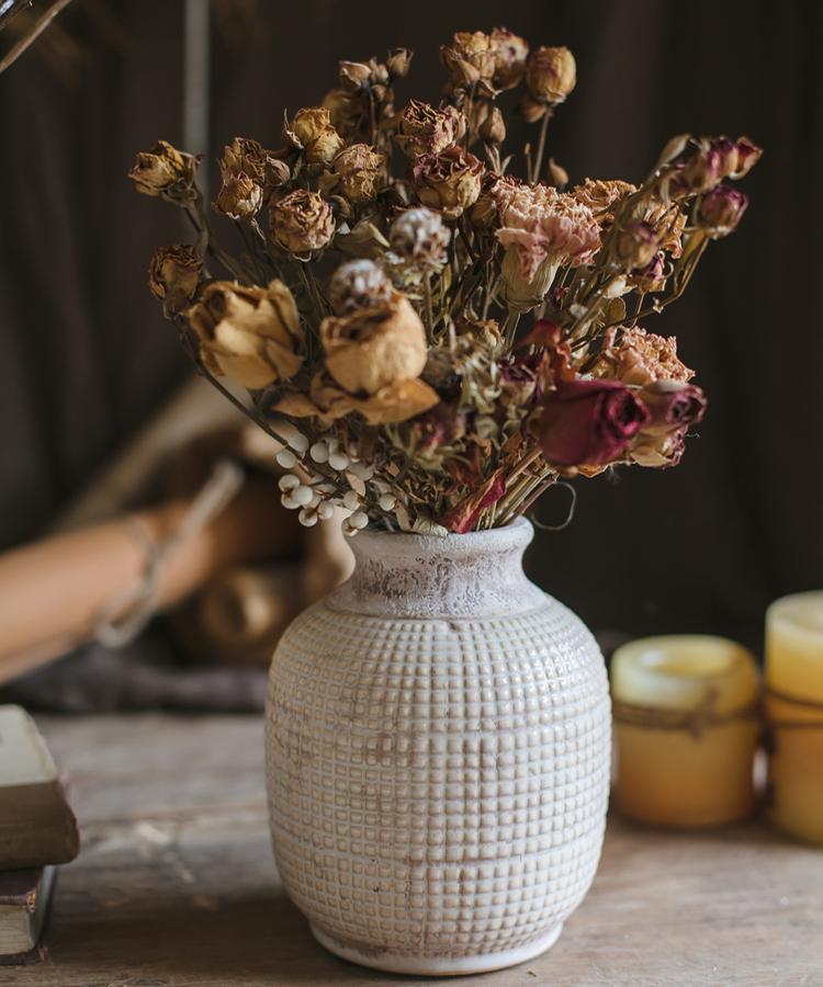 A beautifully handcrafted white textured porcelain ceramic jar vase, showcasing a unique design and elegant finish.