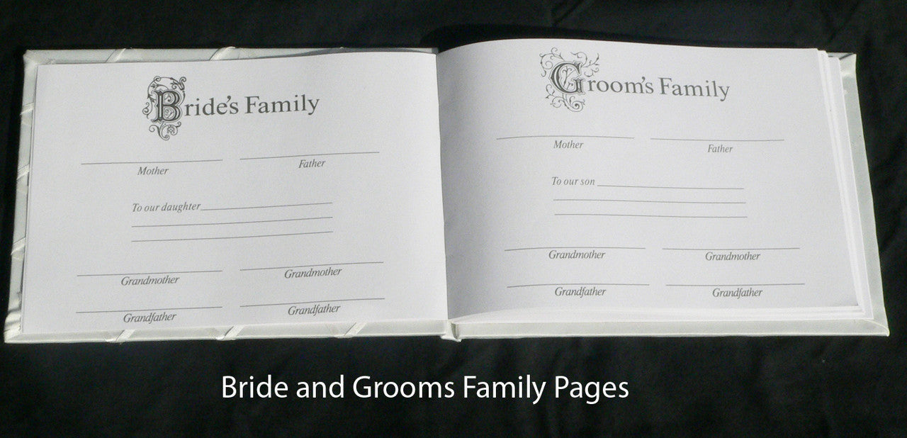 Elegant white wedding guest book set with a silver pen and matching stand, perfect for capturing guest messages.