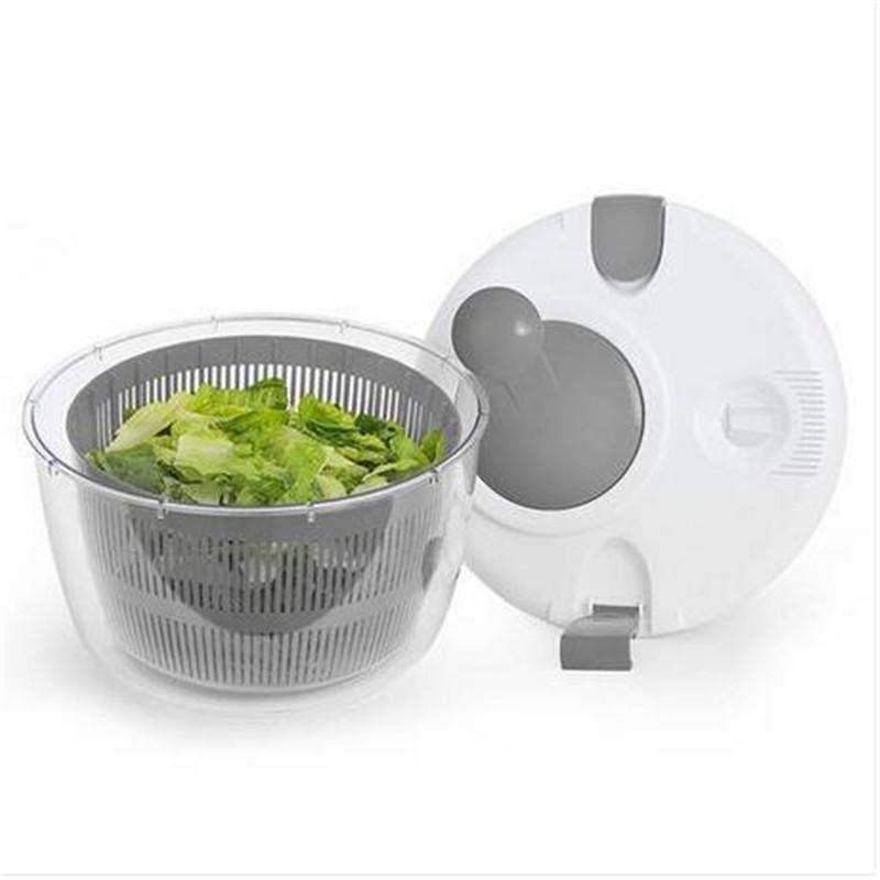 Wholesales Salad Spinner showcasing its ergonomic design and large basin for rinsing and drying vegetables.