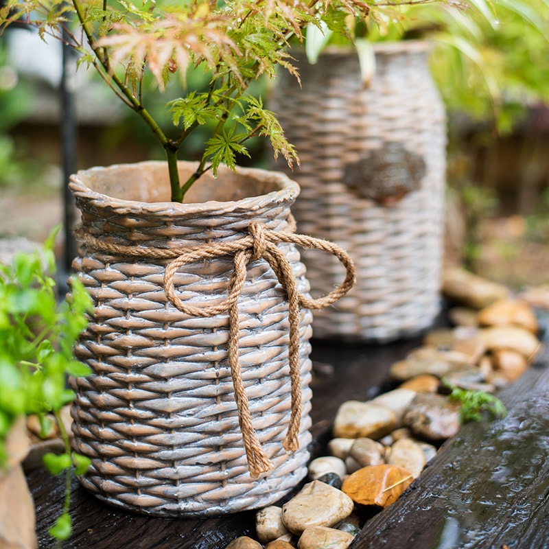 Willow Style Ribbon Concrete Flower Pot with hemp rope design in khaki color, showcasing its elegant and durable structure.