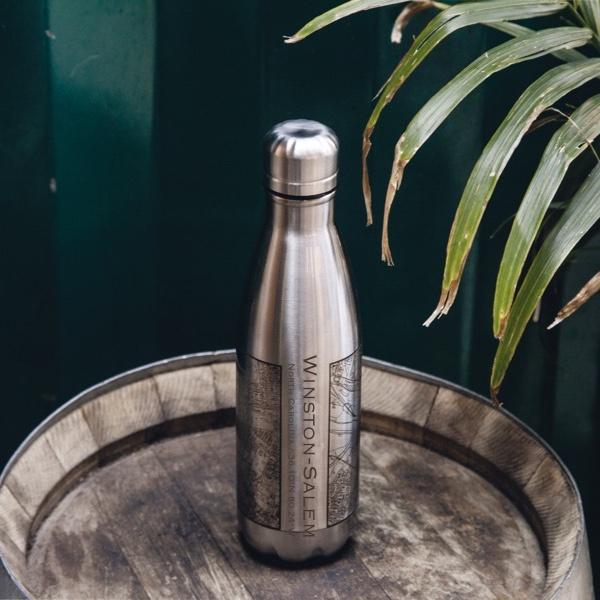 Custom engraved insulated bottle featuring a map of Winston-Salem, North Carolina, with coordinates.