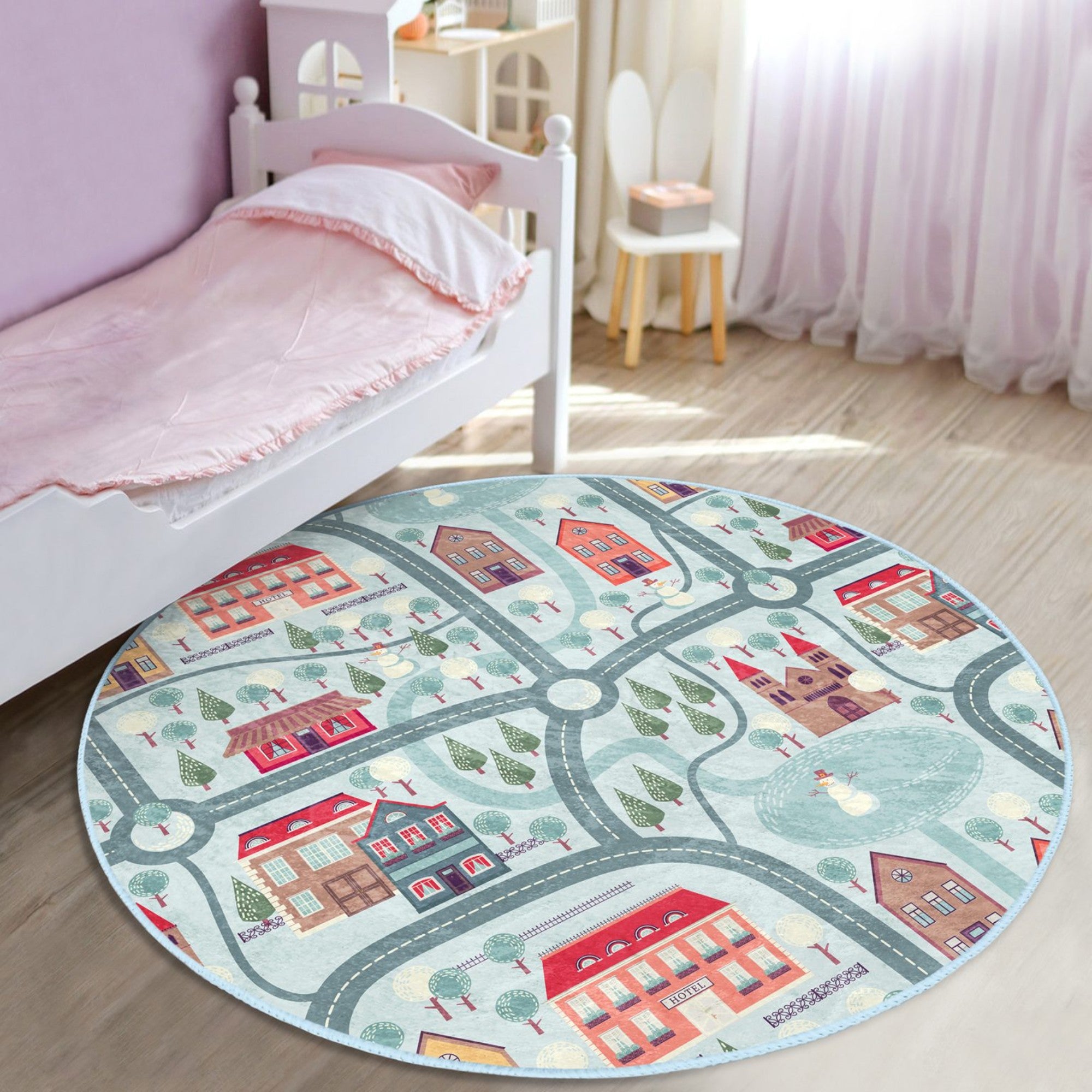 A cozy round rug featuring a playful winter city roads design, perfect for kids' rooms, showcasing vibrant colors and soft texture.