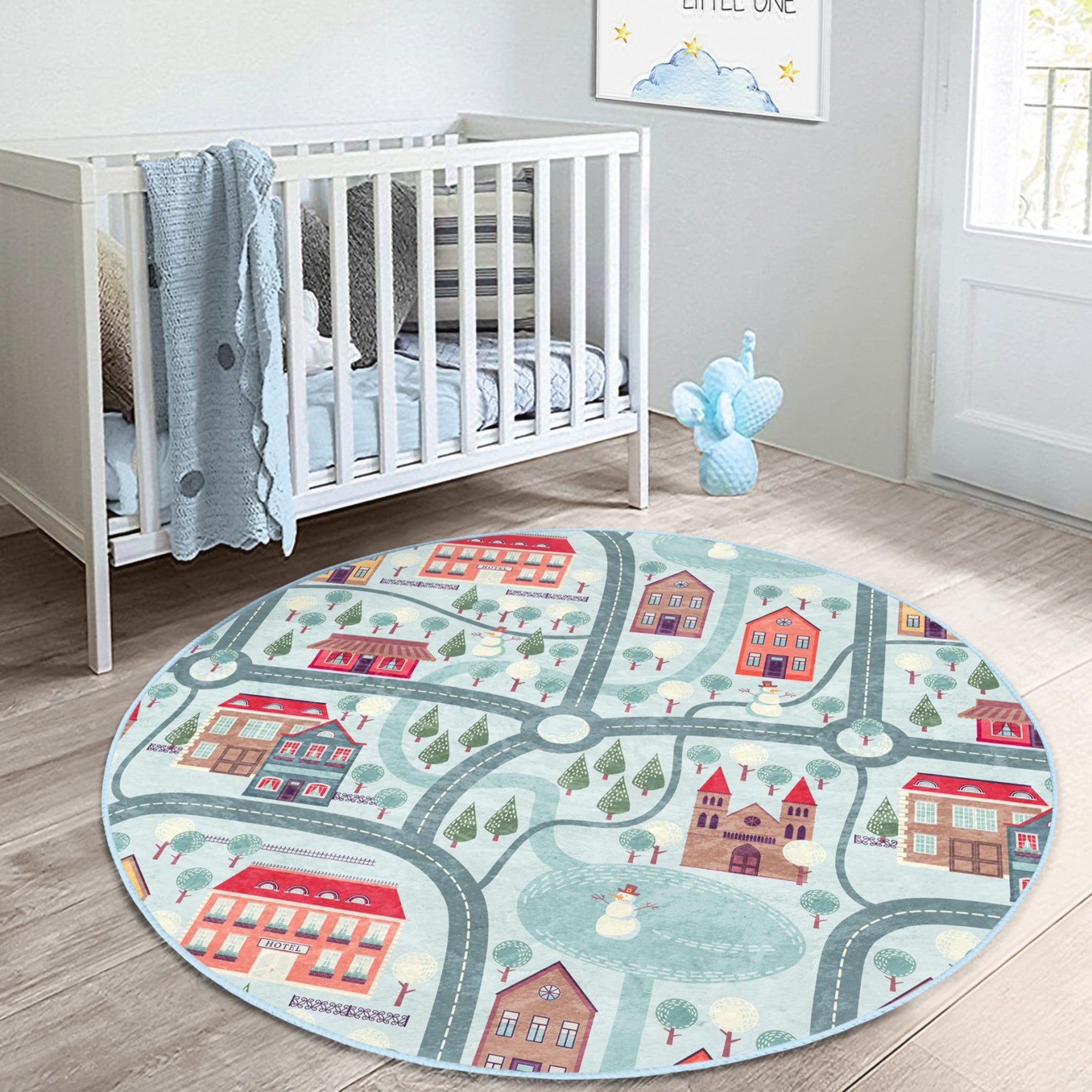 A cozy round rug featuring a playful winter city roads design, perfect for kids' rooms, showcasing vibrant colors and soft texture.