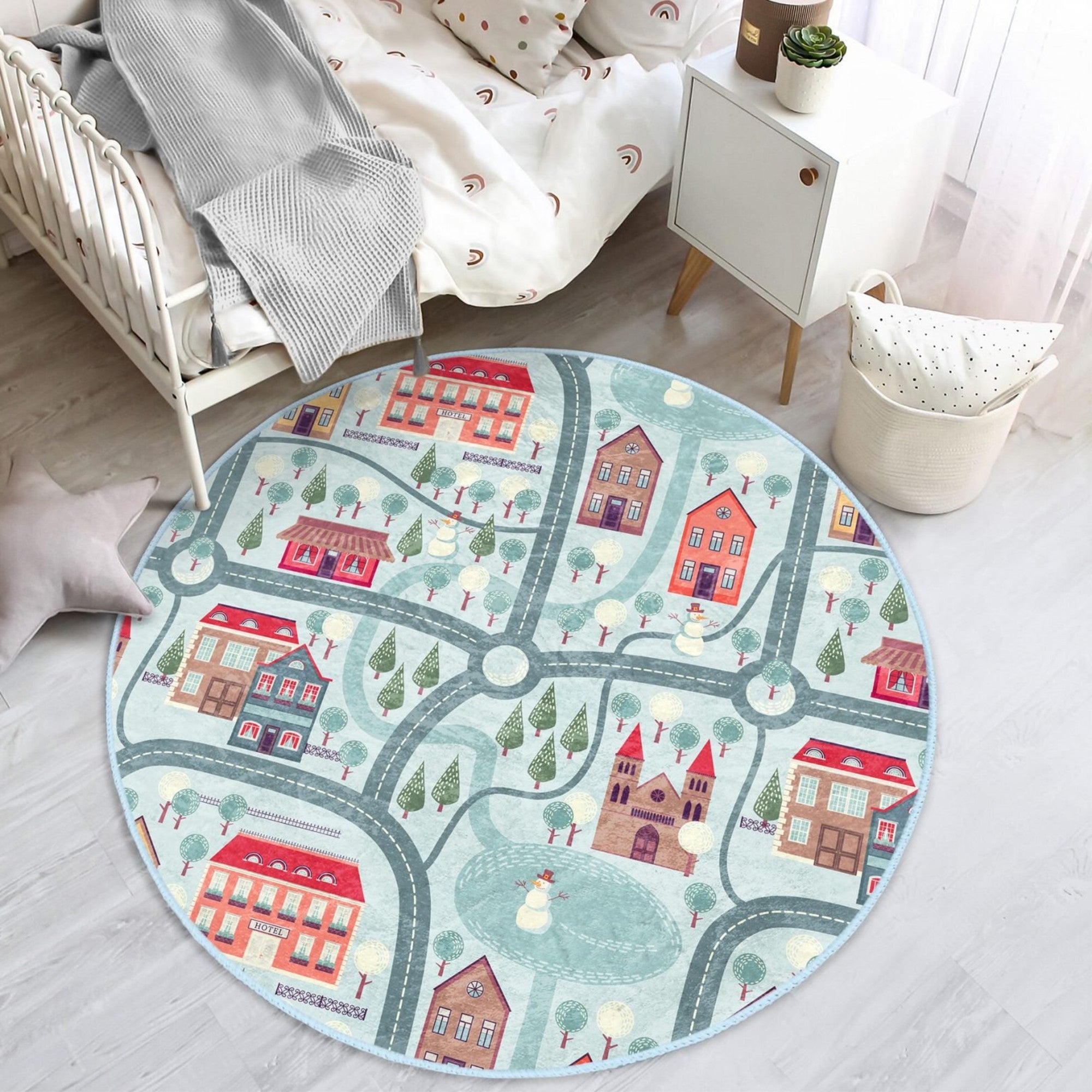 A cozy round rug featuring a playful winter city roads design, perfect for kids' rooms, showcasing vibrant colors and soft texture.