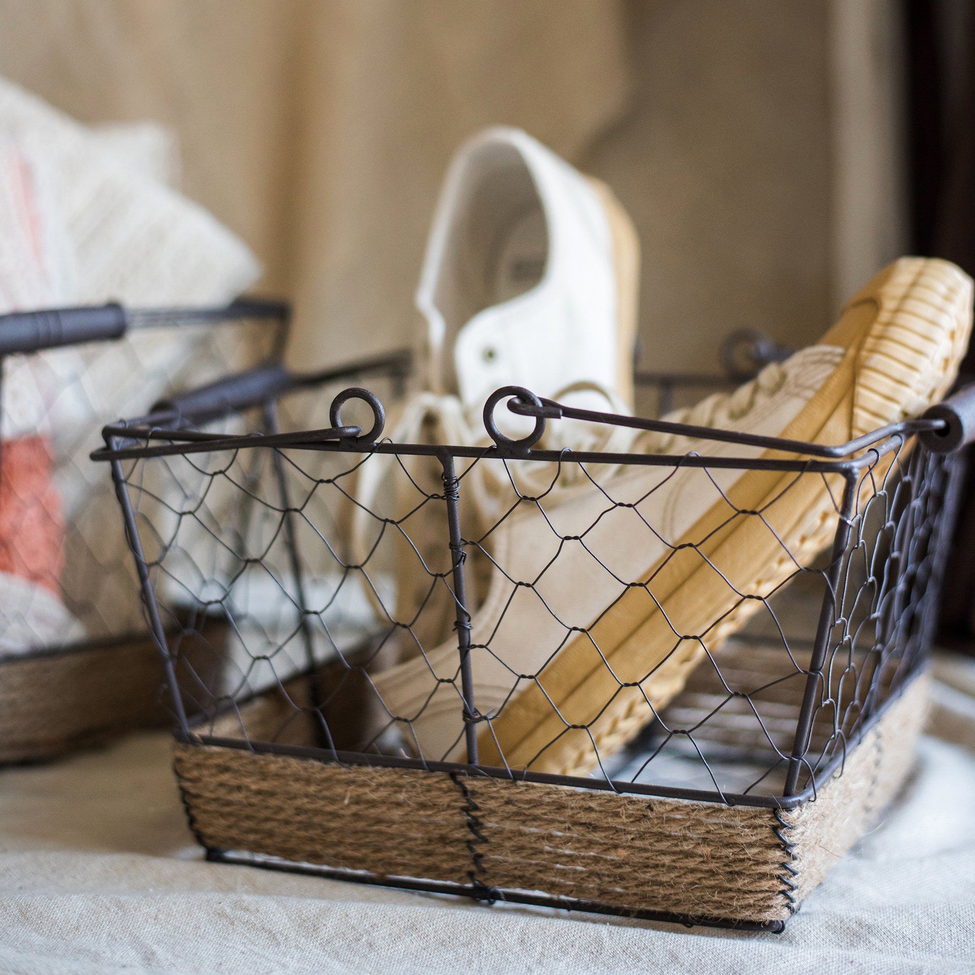 Wire Carry Basket with Hemp Rope Bottom, featuring a sturdy metal frame and natural hemp base, available in various colors.