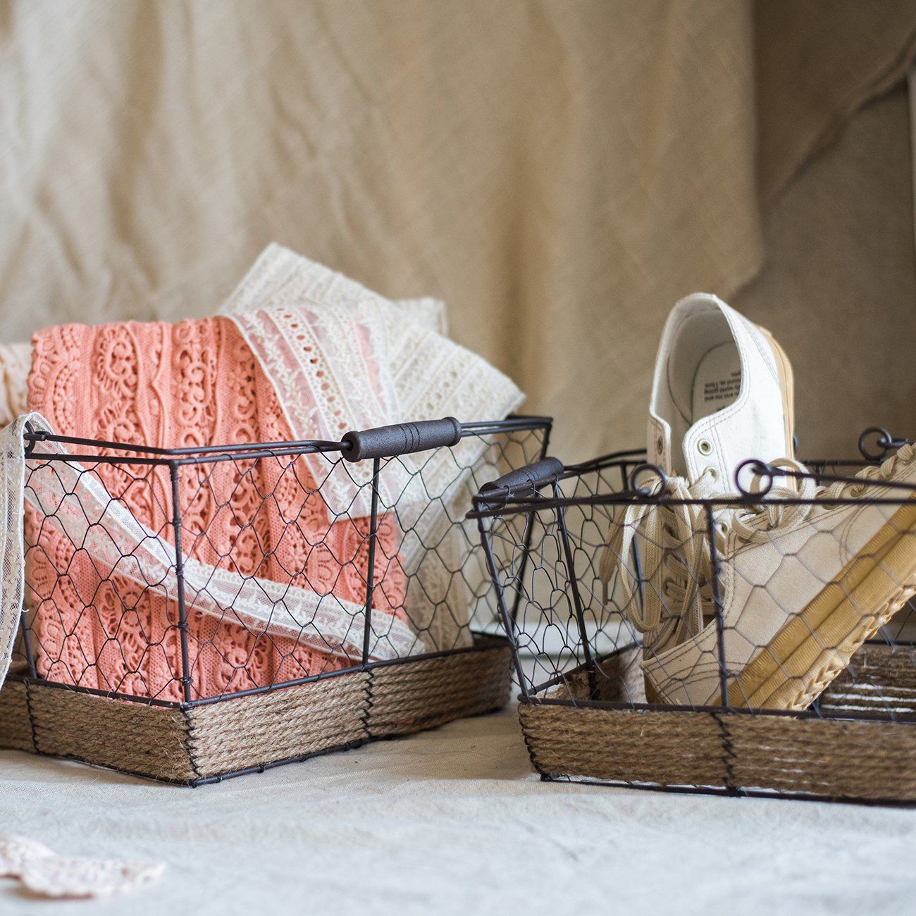 Wire Carry Basket with Hemp Rope Bottom, featuring a sturdy metal frame and natural hemp base, available in various colors.