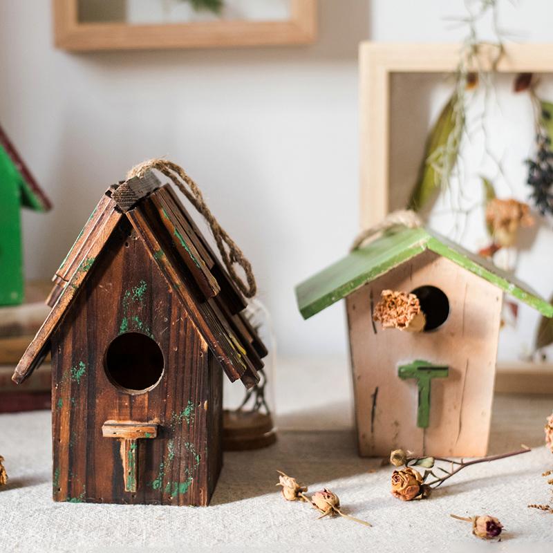 Handcrafted Wood Craft Bird's House Ornament made from solid Chinese fir wood, featuring vibrant colors and a rustic design.