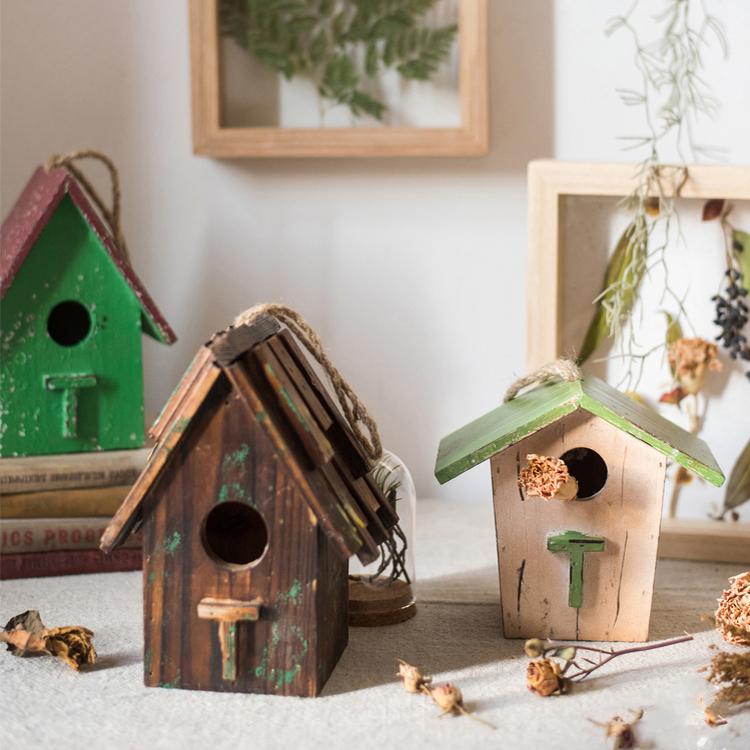 Handcrafted Wood Craft Bird's House Ornament made from solid Chinese fir wood, featuring vibrant colors and a rustic design.