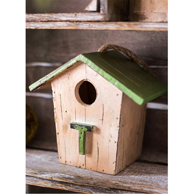 Handcrafted Wood Craft Bird's House Ornament made from solid Chinese fir wood, featuring vibrant colors and a rustic design.