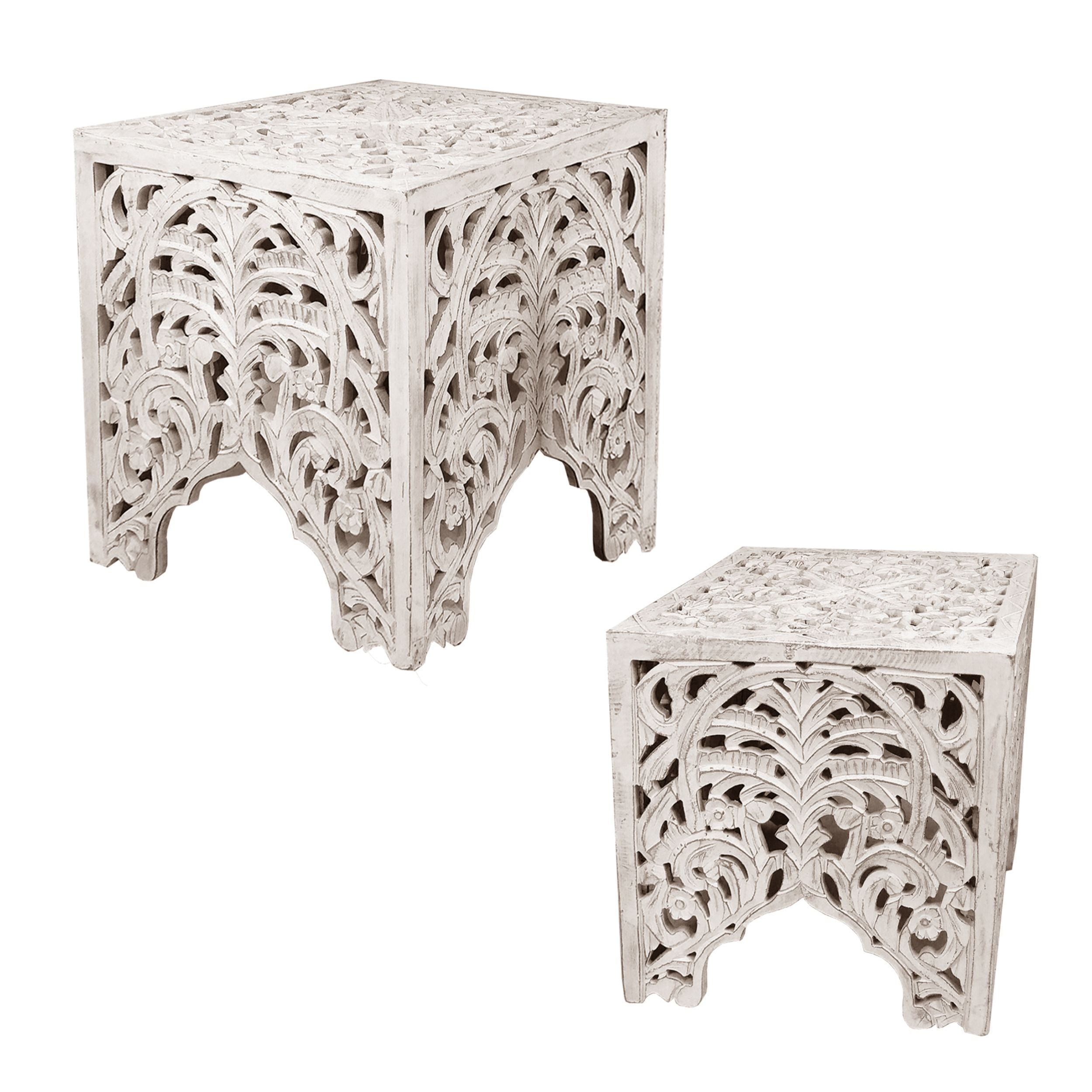 Set of 2 antique white wooden end tables featuring floral cut-out designs, showcasing their elegant and stylish appearance.