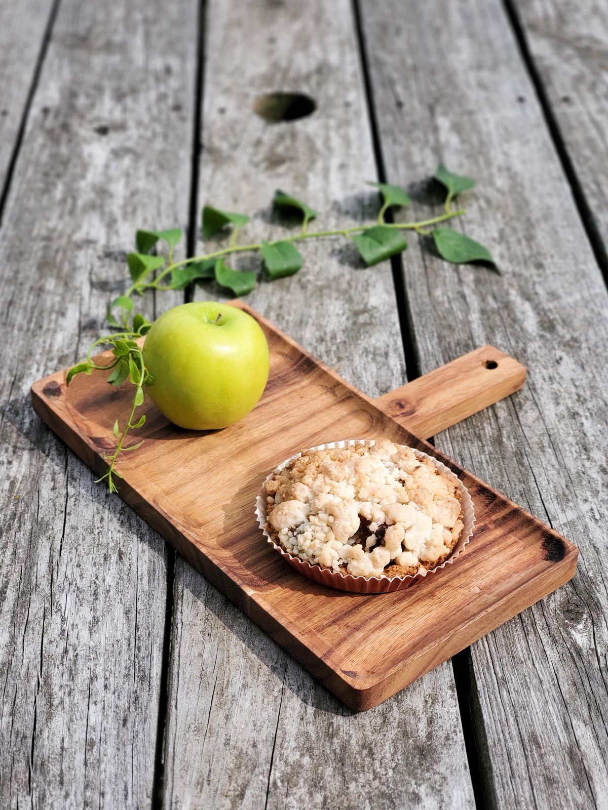 Handcrafted wooden serving tray made from Albizia hardwood, showcasing unique grain patterns and natural finish.