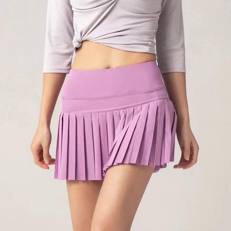 Women 2 In 1 Pleated Skirt Running Shorts in quick-dry polyester, ideal for fitness and tennis, featuring a stylish pleated design.