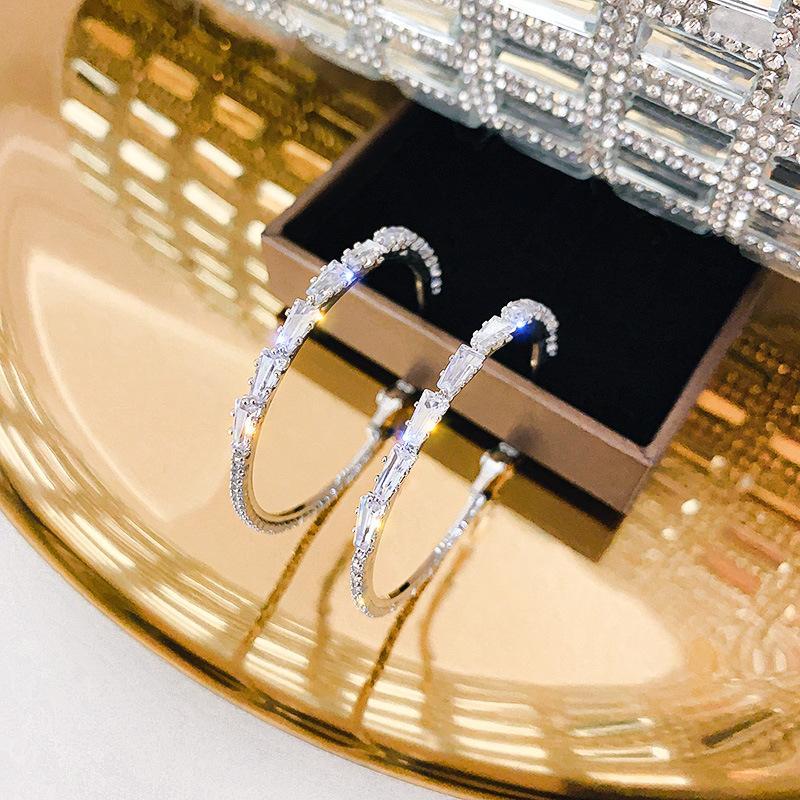 Elegant Women Jewelry wholesale 925 silver needles Euro American zircon Hoop earrings showcasing exquisite design and craftsmanship.