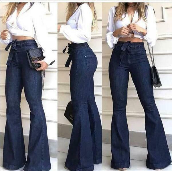 Women's blue stretchy denim trousers with high waist and flared leg style, featuring pockets and tie-up detail.