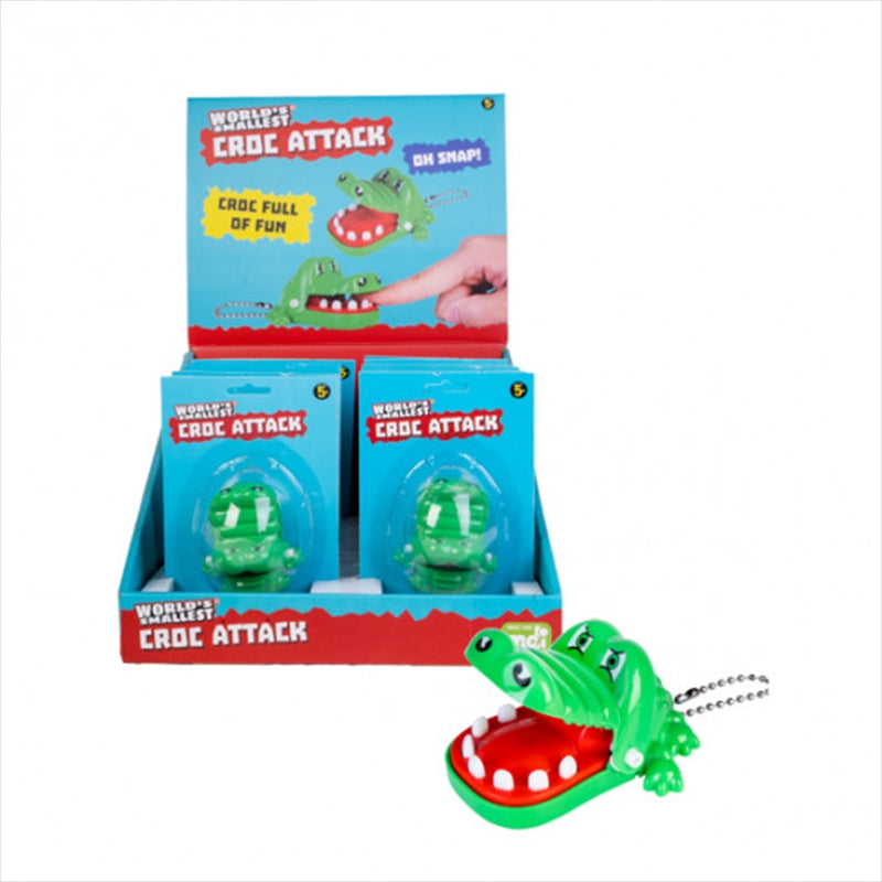 A compact and colorful World's Smallest Croc Attack game featuring a crocodile with movable jaws and teeth.