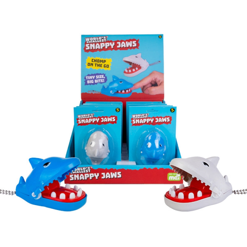 World's Smallest Shark Attack game featuring mini jaws and colorful design, perfect for fun and portable gaming.