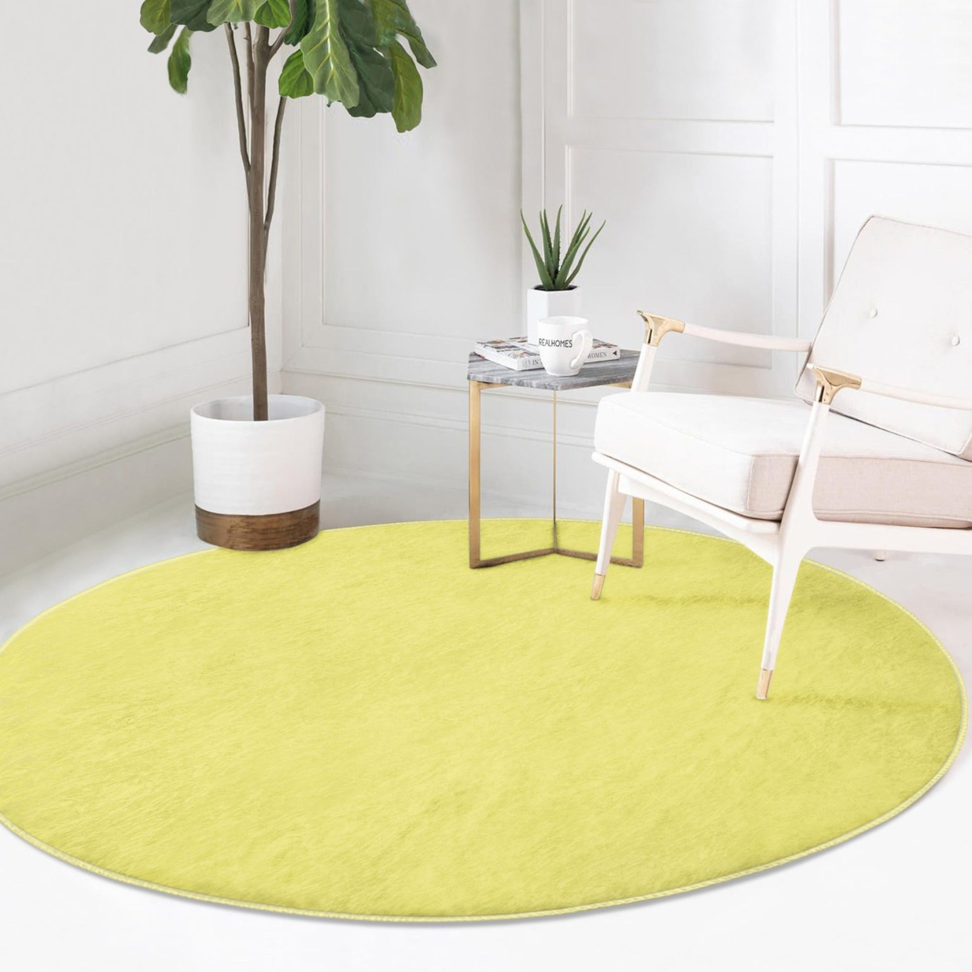 A vibrant yellow round rug made of soft velvet fabric, perfect for living room decor.