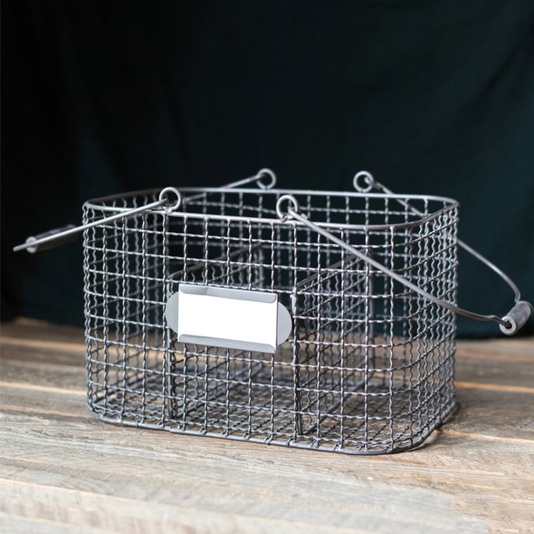 Zakka Multifunctional Wire Organizer Basket in dark gray and black, showcasing its compact design and sturdy handle.