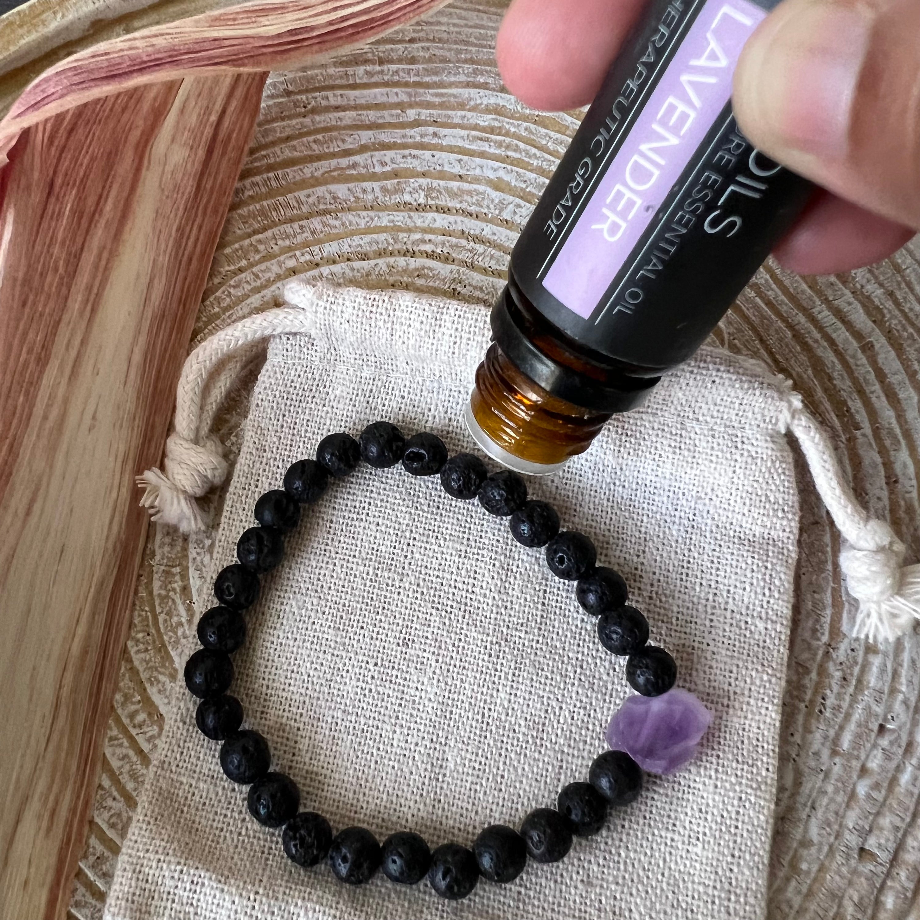 Amethyst and Lava Stone Diffuser Bracelet showcasing natural lava beads and raw amethyst, perfect for aromatherapy.