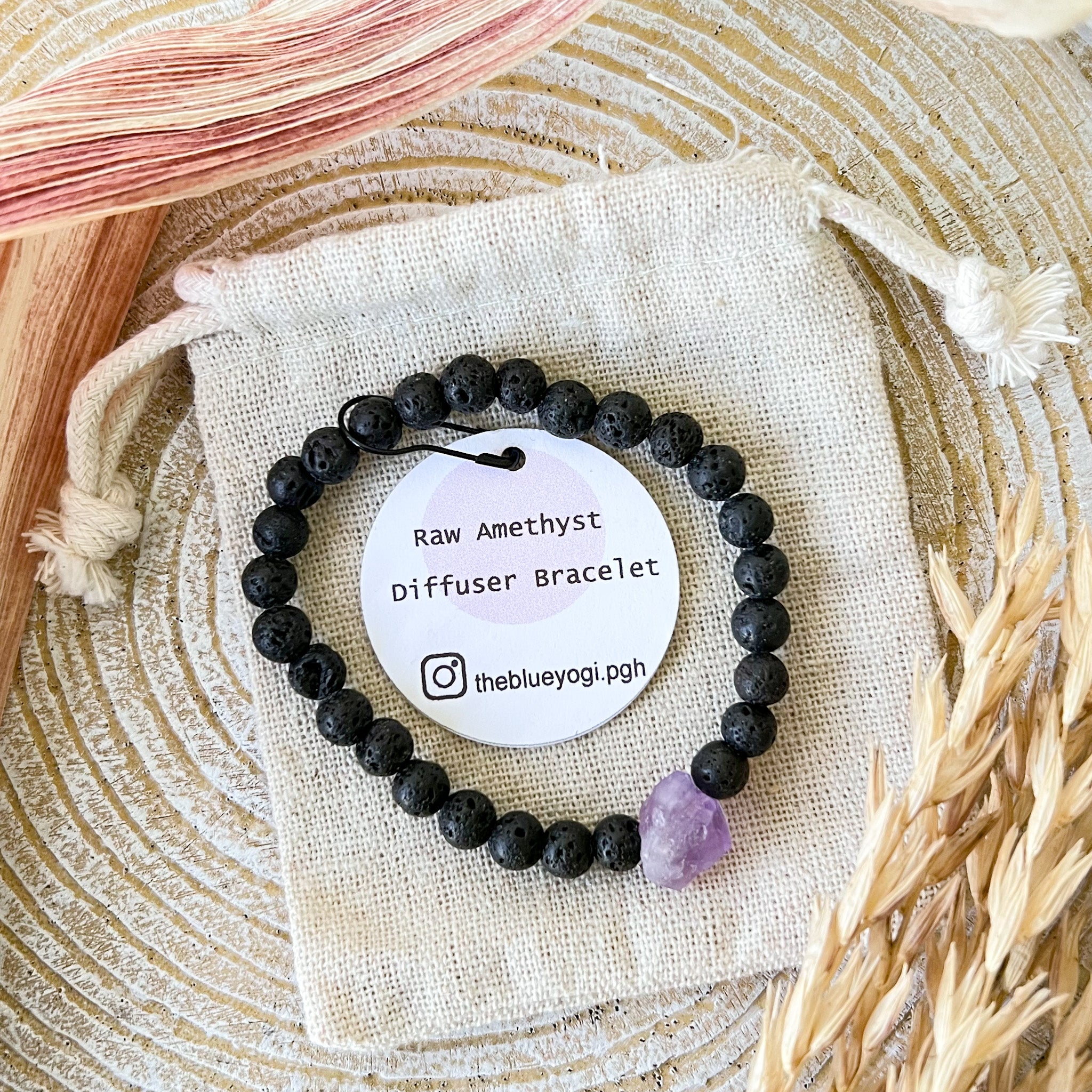 Amethyst and Lava Stone Diffuser Bracelet showcasing natural lava beads and raw amethyst, perfect for aromatherapy.