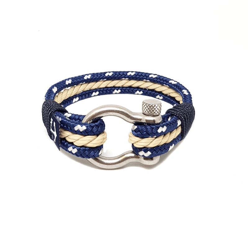 Batavia Nautical Bracelet featuring blue and beige sailing ropes with a stainless steel shackle, elegantly displayed on a wooden surface.