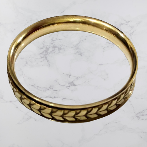 Bohotusk Feather Design Brass Bangle Bracelet showcasing intricate feather patterns and elegant brass finish.