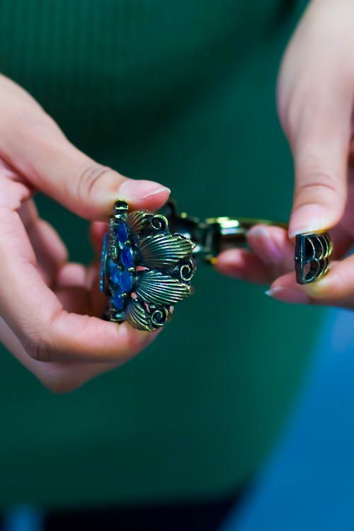 Antique Series Indigo Bracelet featuring high-quality brass with a blue accent, showcasing a vintage design.