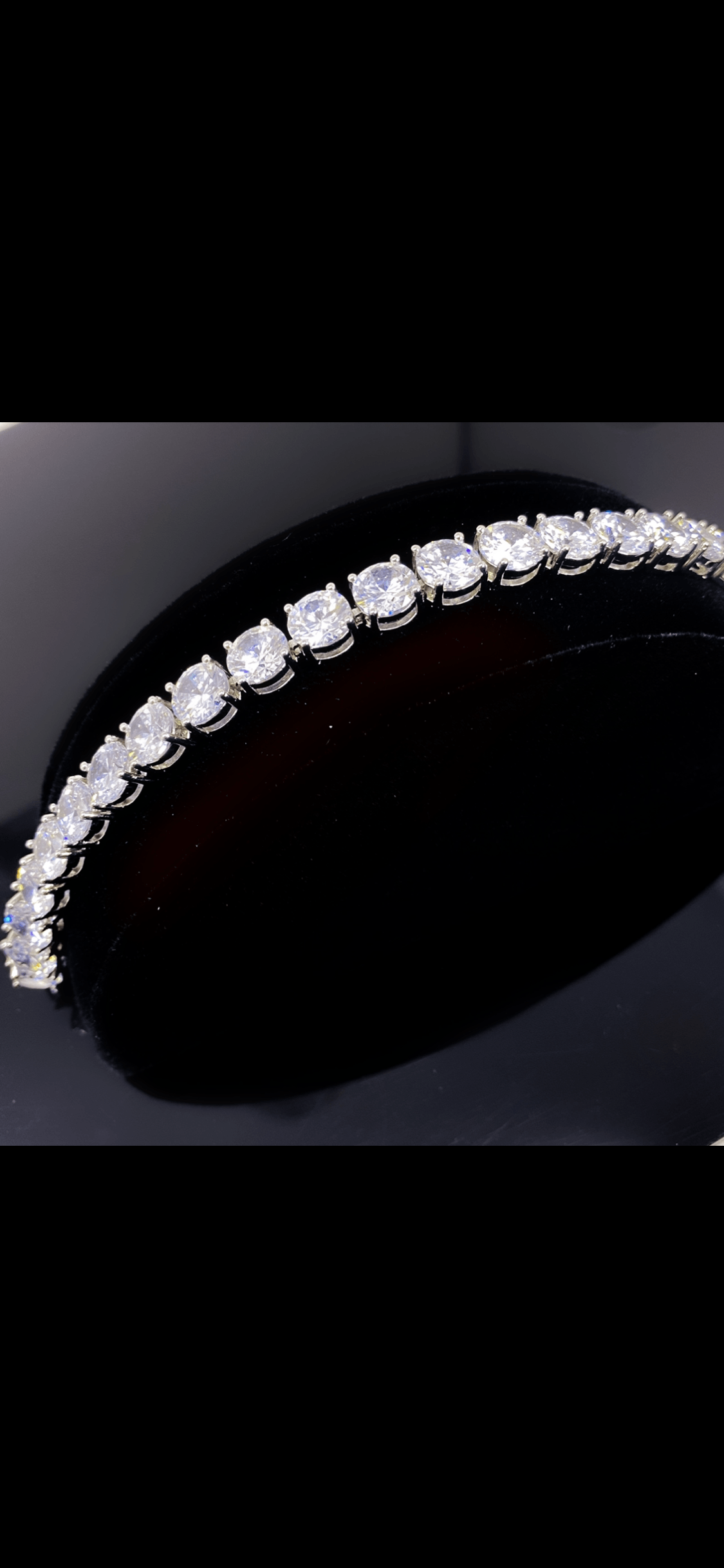 So Icy Diamond Bracelet made of high polished 14K white gold with flawless VVS simulants, showcasing a luxurious and elegant design.