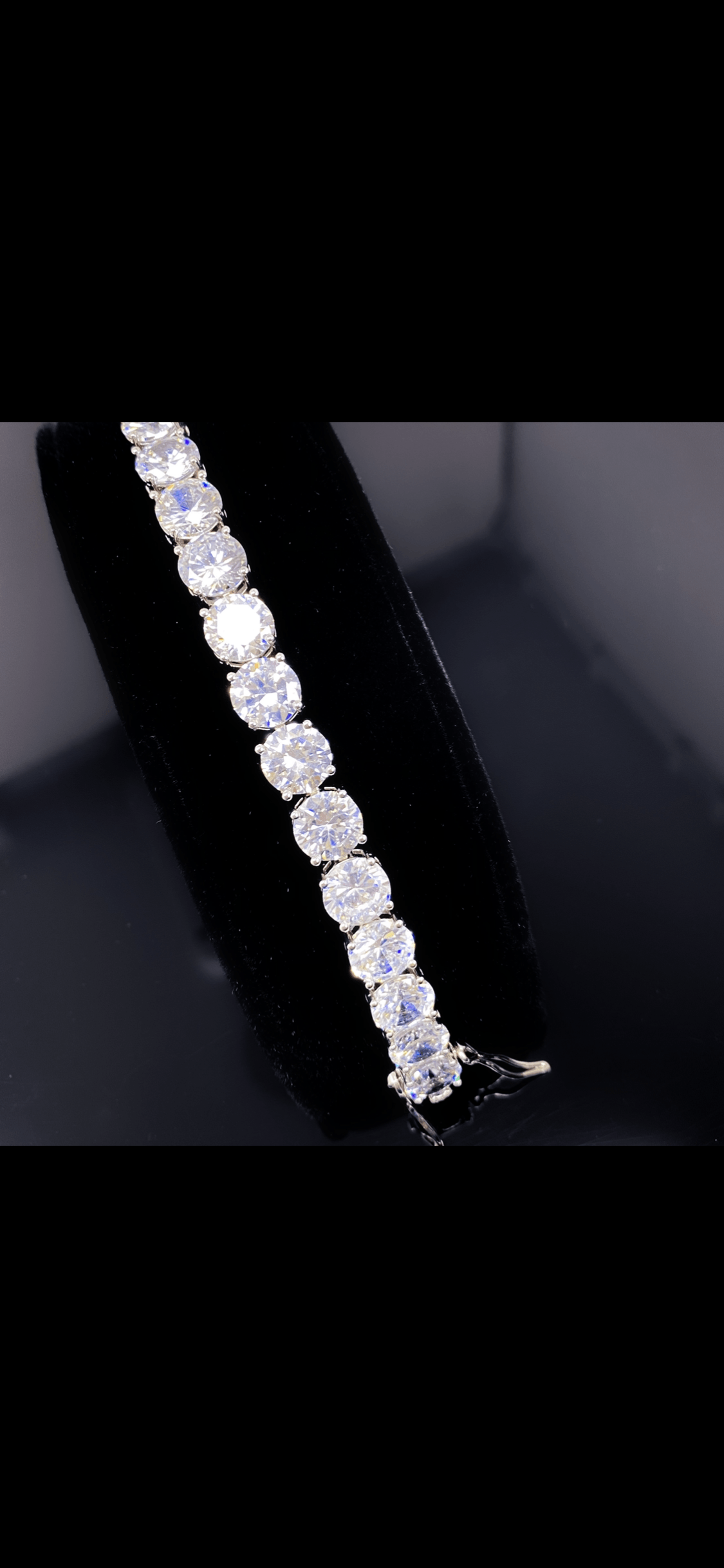 So Icy Diamond Bracelet made of high polished 14K white gold with flawless VVS simulants, showcasing a luxurious and elegant design.