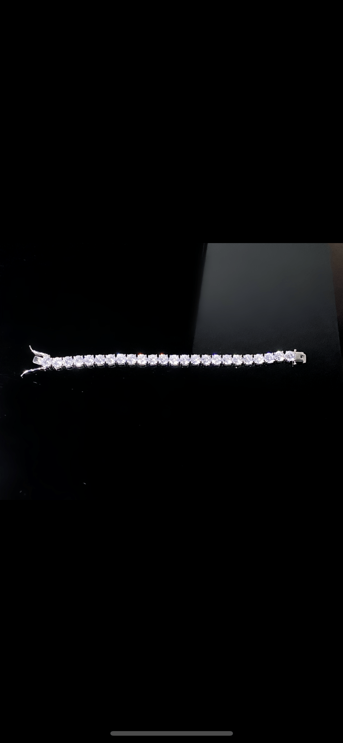 So Icy Diamond Bracelet made of high polished 14K white gold with flawless VVS simulants, showcasing a luxurious and elegant design.