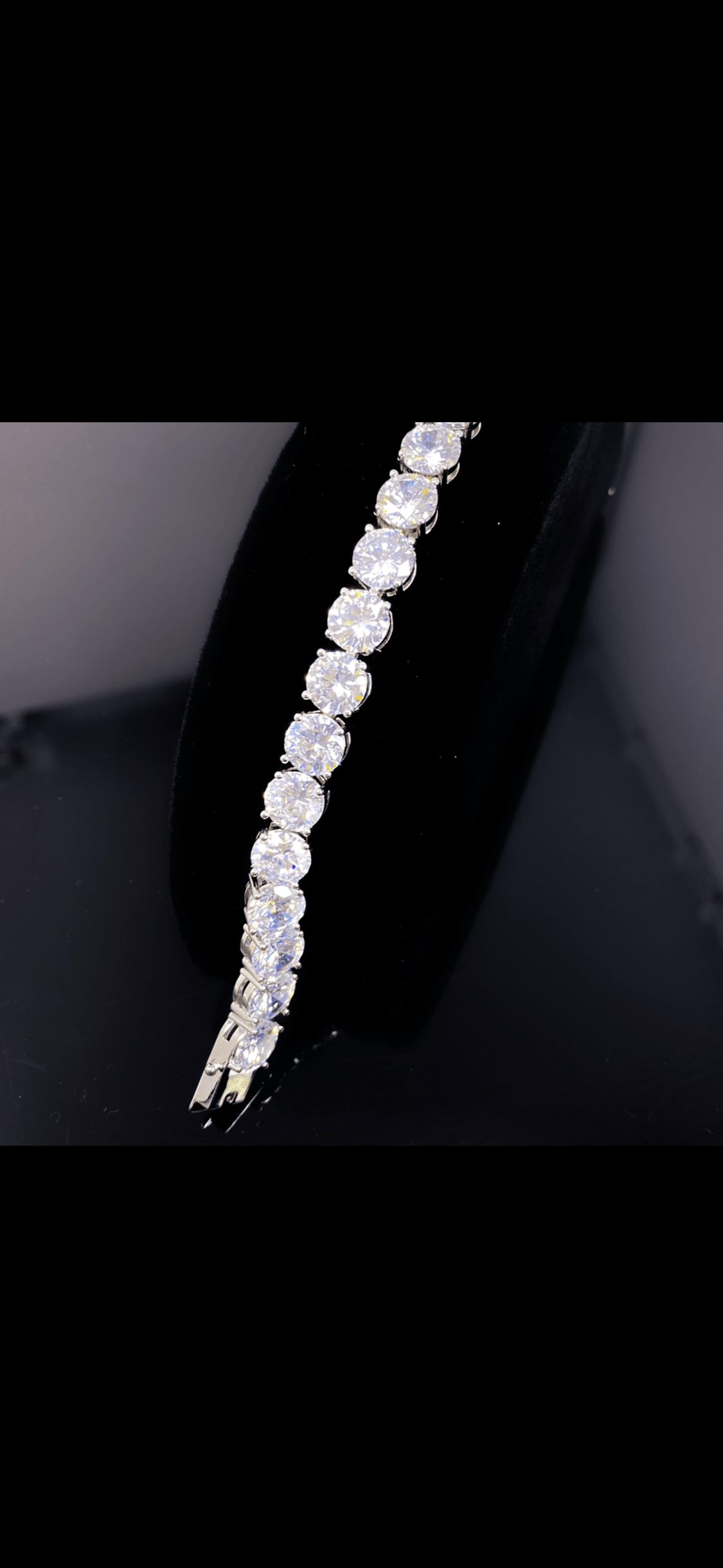 So Icy Diamond Bracelet made of high polished 14K white gold with flawless VVS simulants, showcasing a luxurious and elegant design.