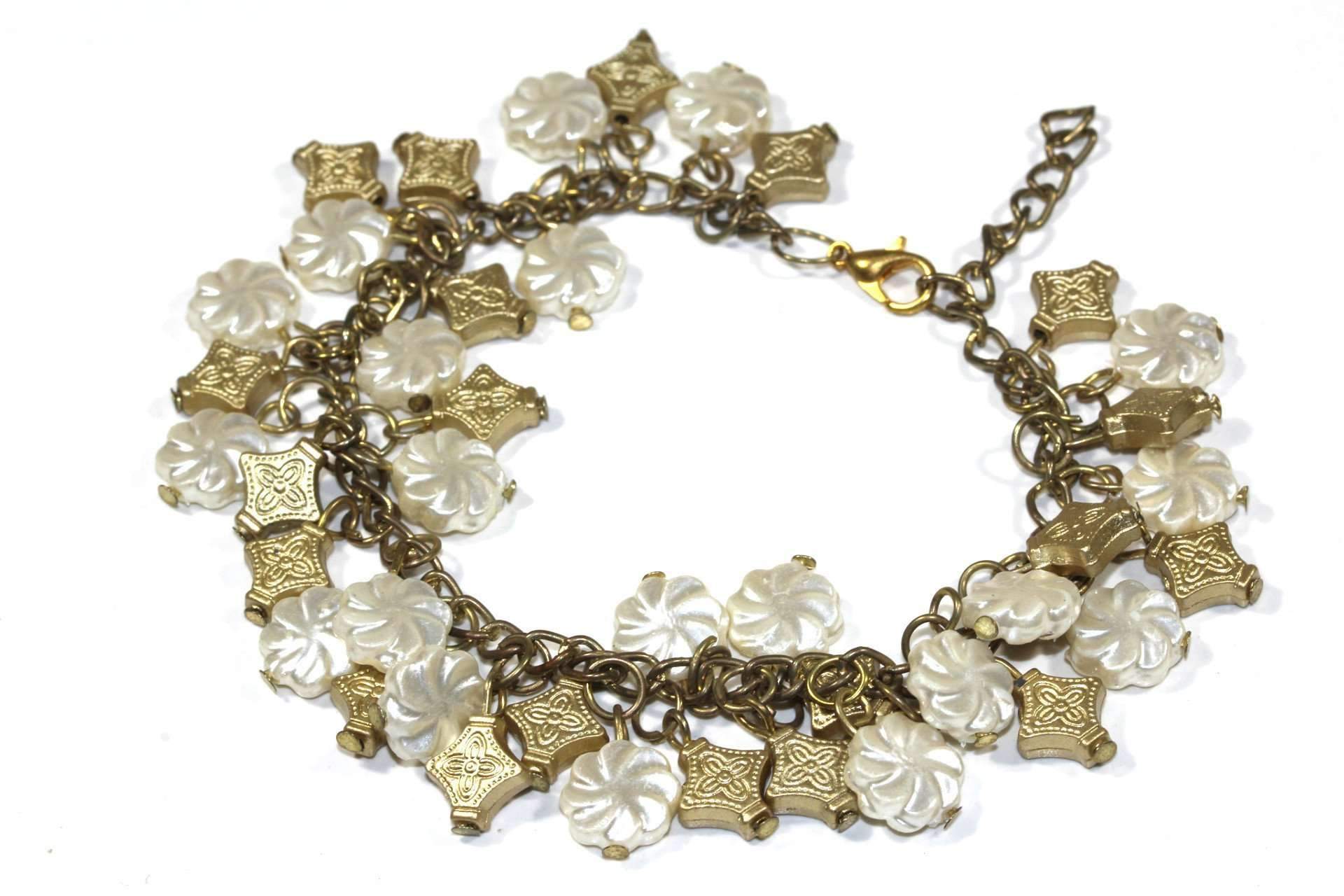 Antique gold tone Celtic Cross Charm Bracelet with flower charms, showcasing intricate details and a lobster clasp.