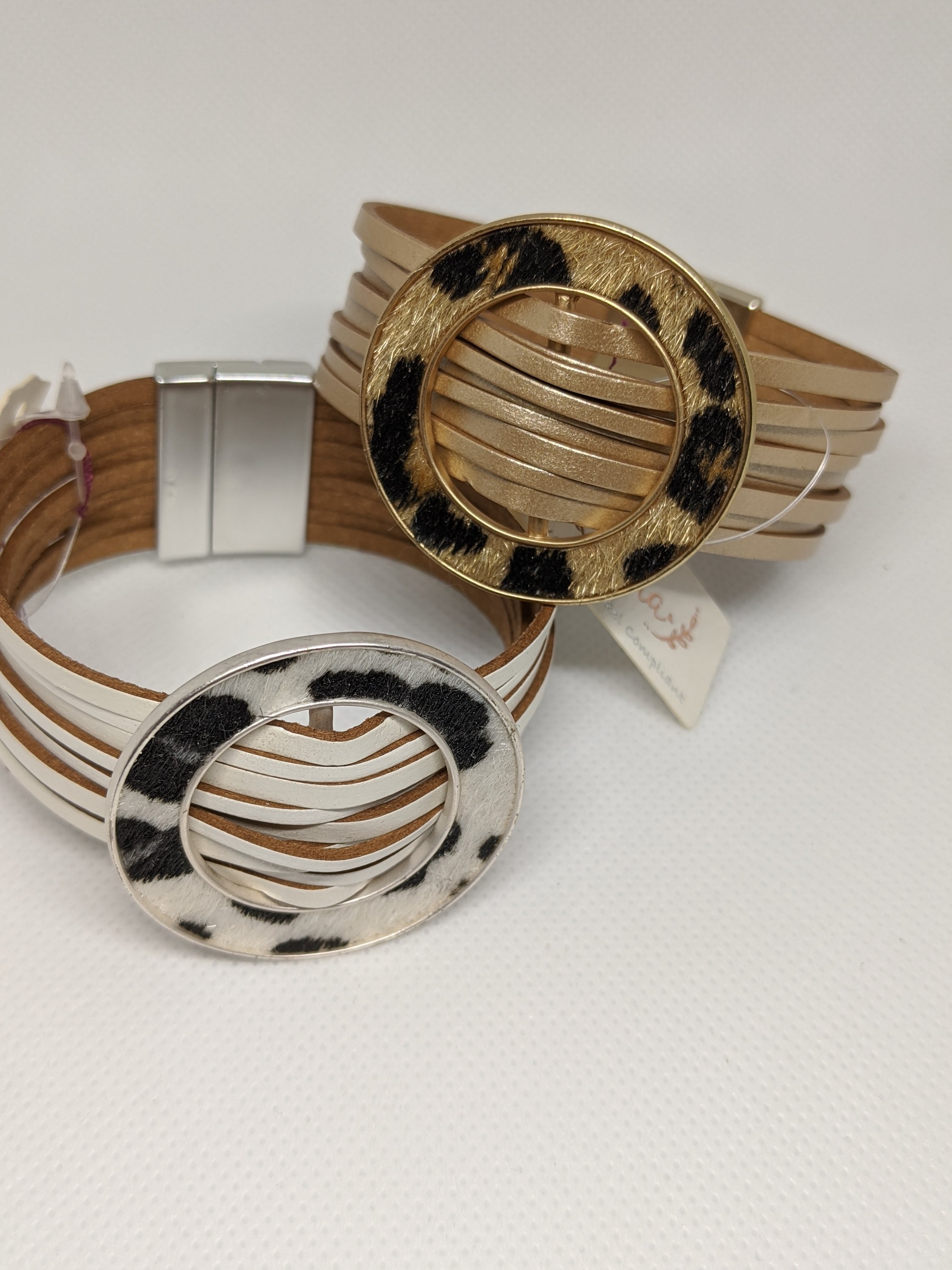 Cheetah Faux Leather Magnetic Bracelet featuring spliced leather and gold ring accent, stylish and trendy accessory.