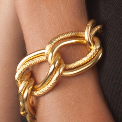 Emma Double Link Bracelet featuring large brushed and polished gold-plated links, secured with a lobster clasp, perfect for stacking.