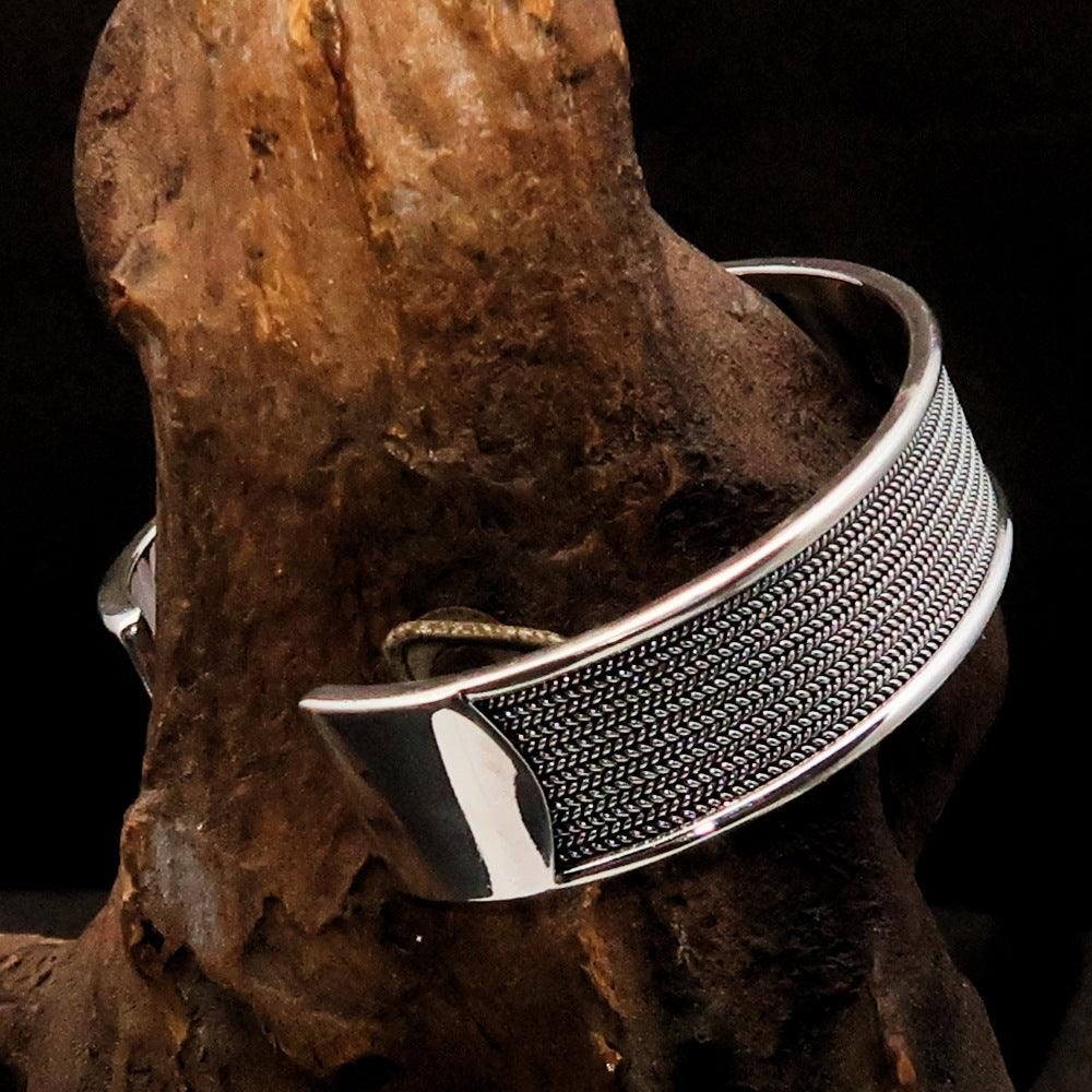 A beautifully handcrafted minimalistic sterling silver bracelet, showcasing its elegant design and hallmark 925.