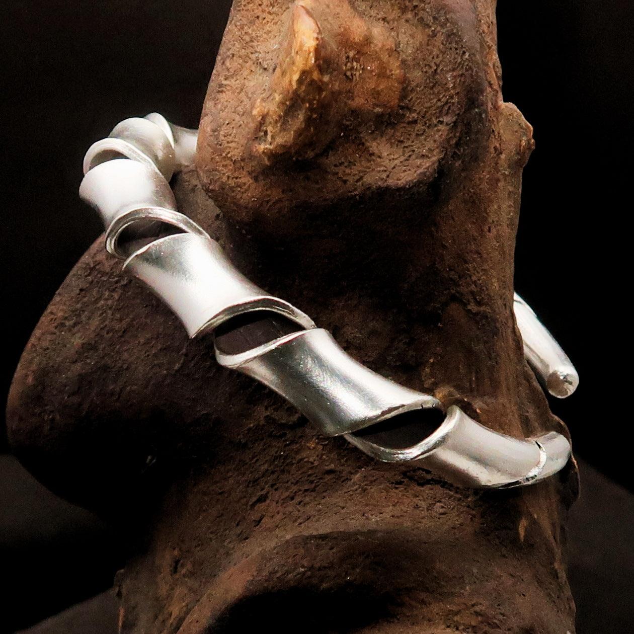 A beautifully handcrafted TWISTED Sterling Silver Bracelet showcasing its elegant twisted design and hallmark 925.