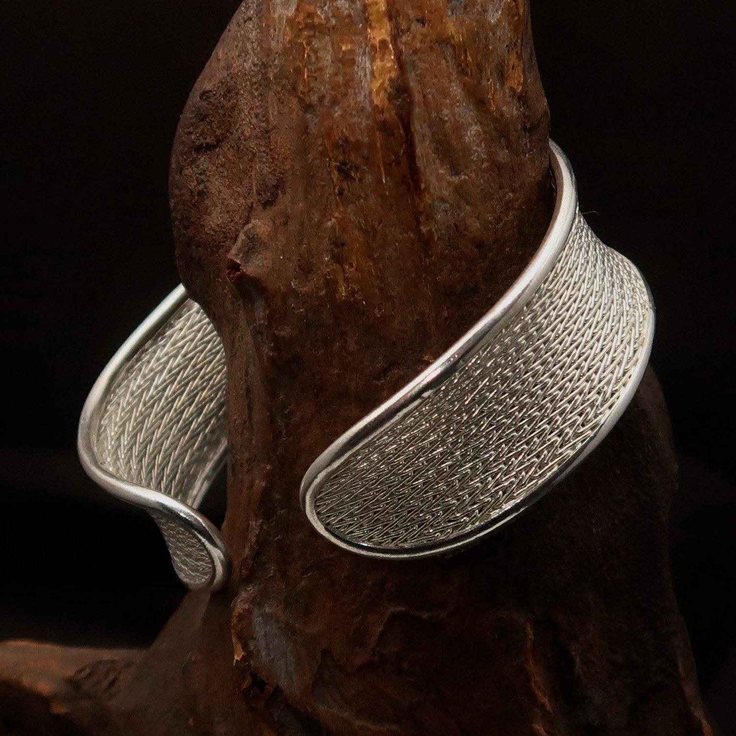 A beautifully handcrafted woven Sterling Silver Bracelet Bangle with a 925 hallmark, showcasing intricate design and comfortable fit.