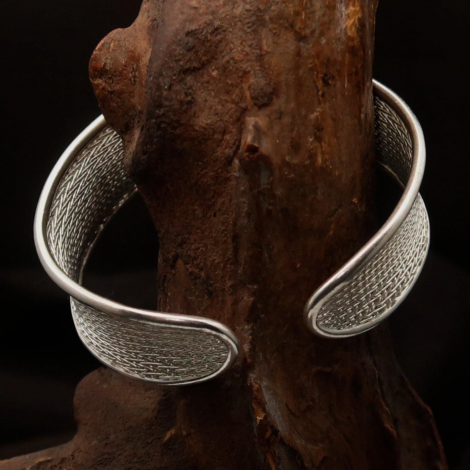 A beautifully handcrafted woven Sterling Silver Bracelet Bangle with a 925 hallmark, showcasing intricate design and comfortable fit.