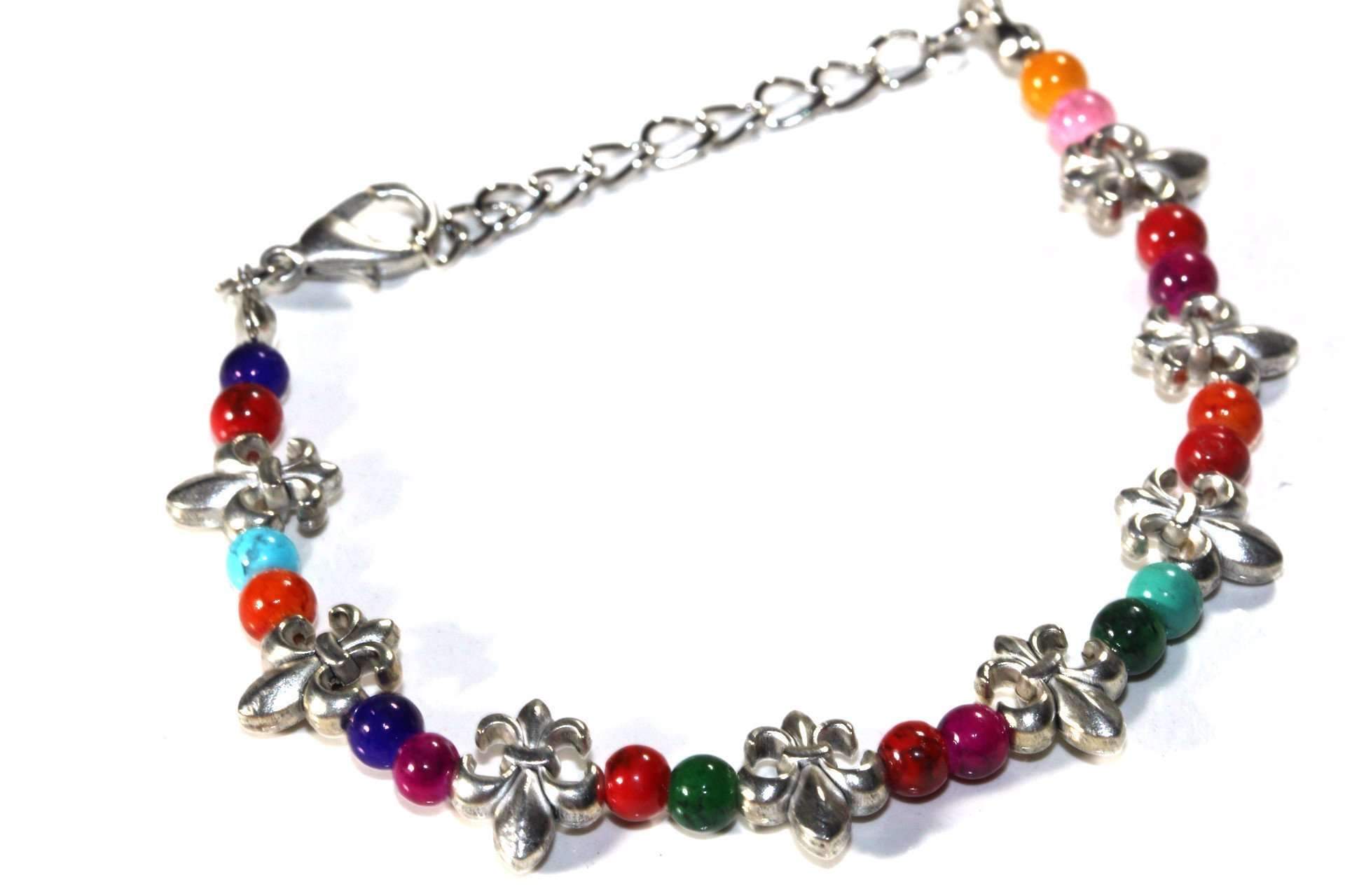 A vibrant Fleur De Lis Colorful Bracelet featuring shiny marbled beads and elegant charms, perfect for spring and summer outfits.